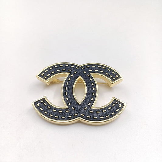18K  Chanel Black Brooch