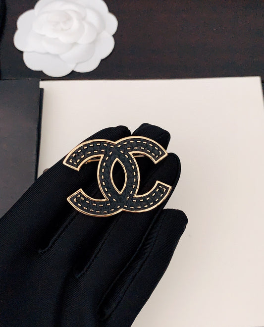 18K  Chanel Black Brooch